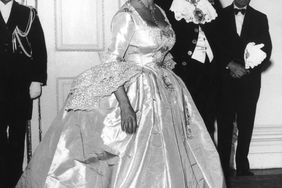 Princess Margaret (1930 - 2002) wearing an eighteenth Century ballgown
