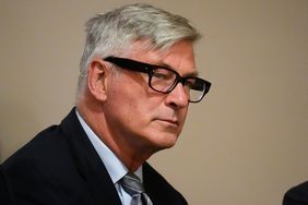 Alec Baldwin listens to testimony during a pretrial hearing at the First Judicial District Courthouse on July 8, 2024 in Santa Fe, New Mexico. Baldwin is facing a single charge of involuntary manslaughter in the death of cinematographer Halyna Hutchins on the set of the film "Rust". 