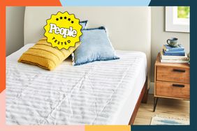 People Tested badge image of mattress pad on bed topped with pillows