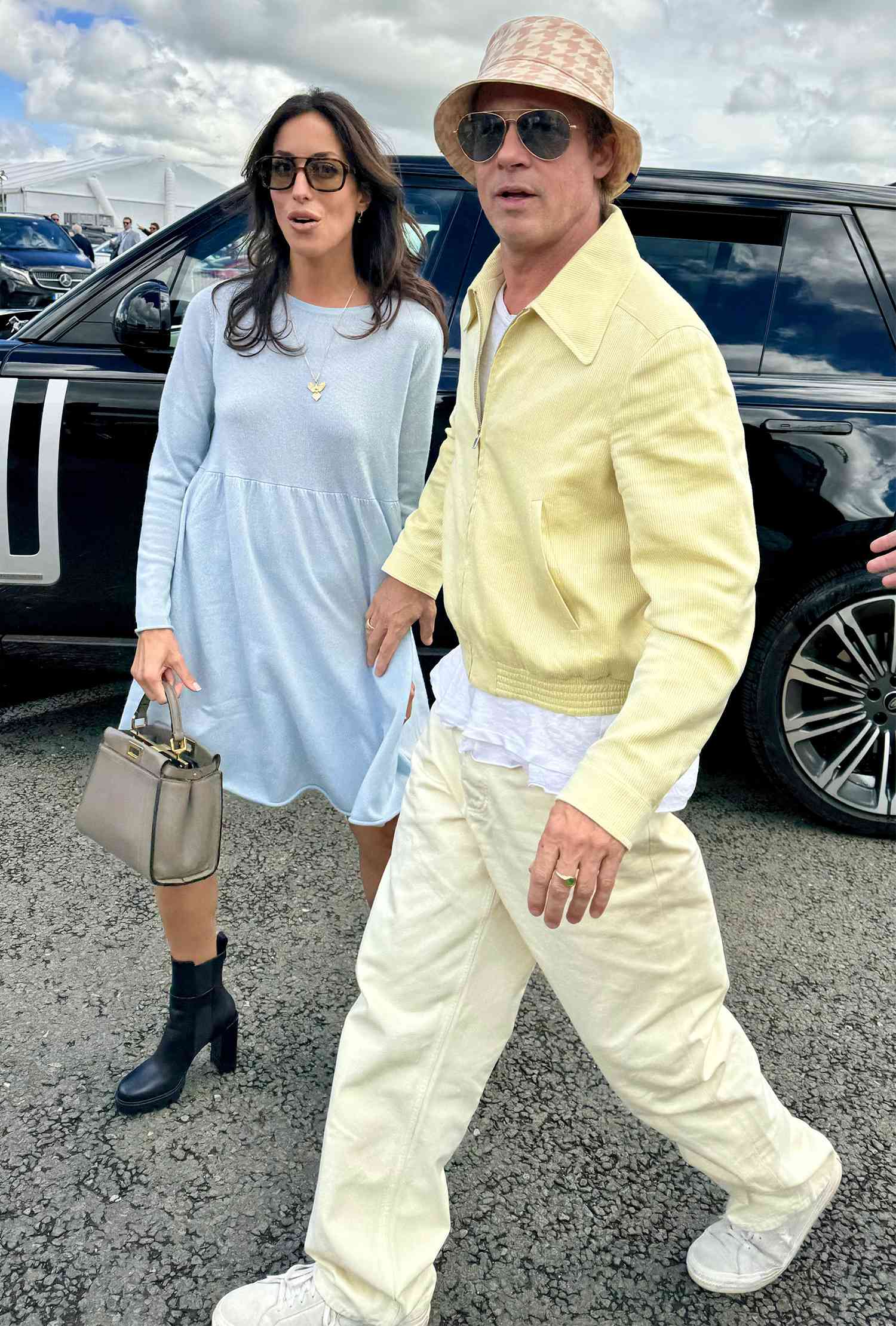 Brad Pitt arrives at the British Grand Prix Formula One at Silverstone with his girlfriend Ines De Ramon