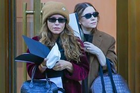 Twin sisters Ashley Olsen and Mary-Kate Olsen are seen together as they arrive in style on November 2, 2023 in New York City. 