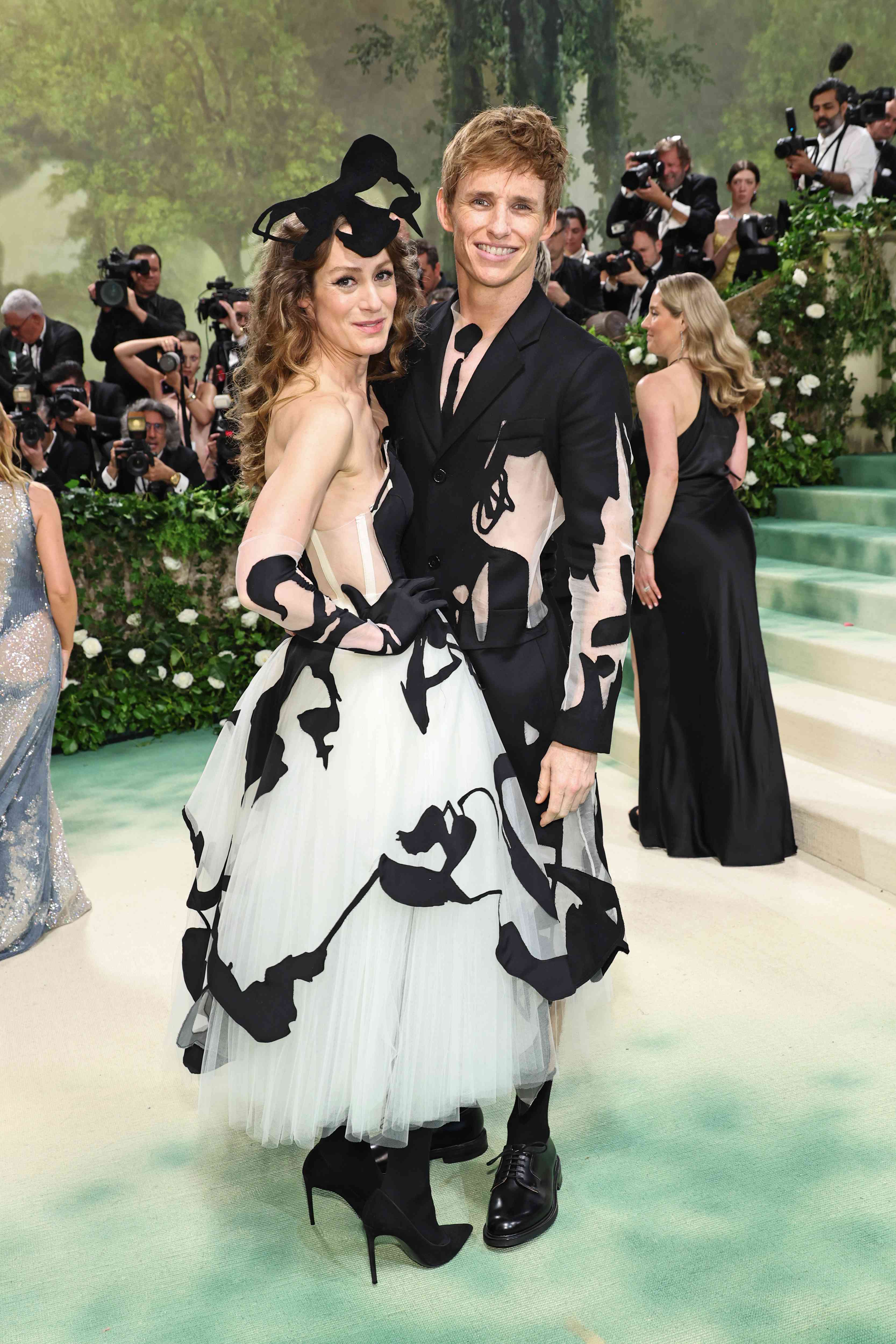 Hannah Bagshawe and Eddie Redmayne in Black-and-White Matching Attire on Met Gala 2024 Red Carpet