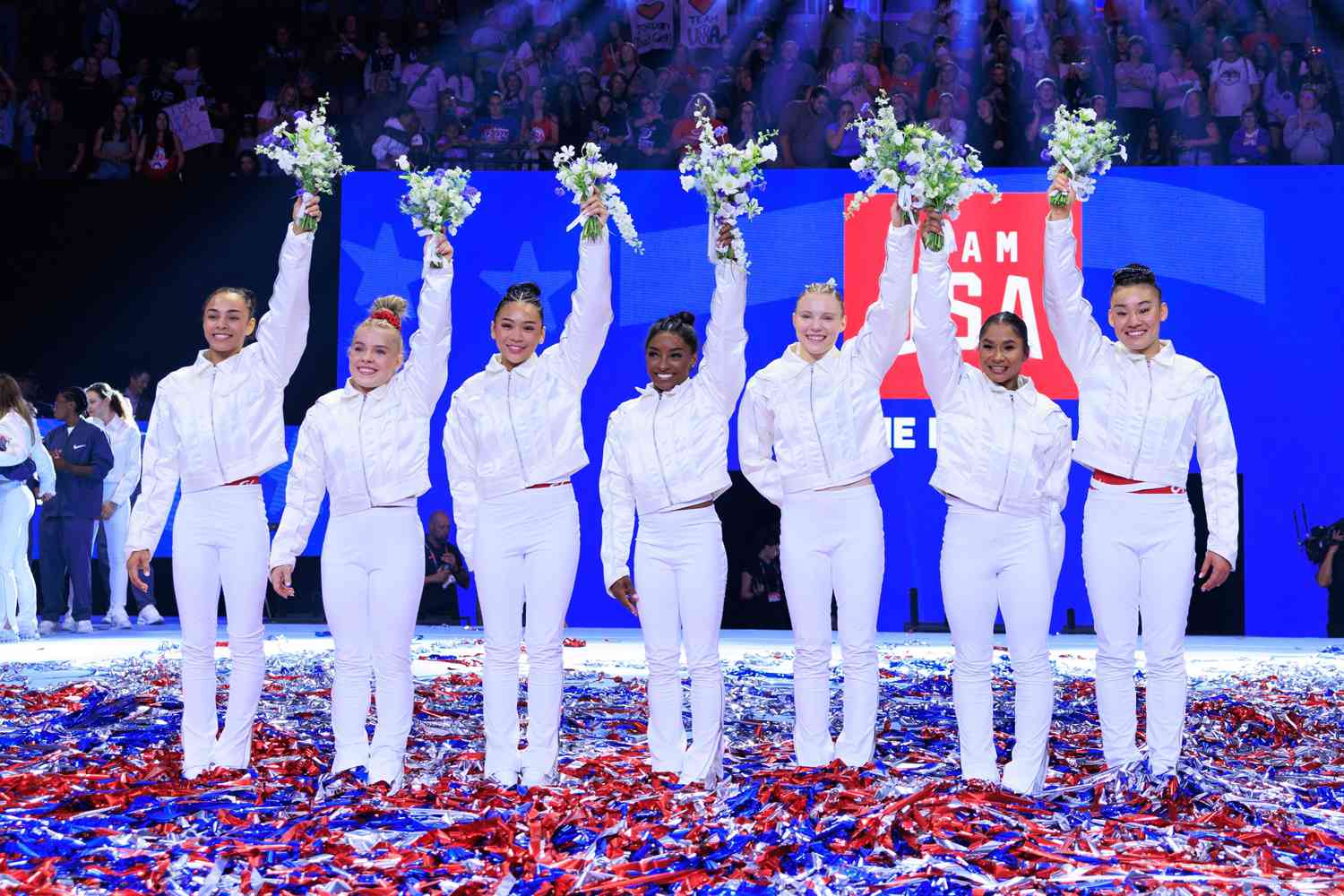 Hezly Rivera, Joscelyn Roberson (alternate), Suni Lee, Simone Biles, Jade Carey, Jordan Chiles, and Leanne Wong (alternate) celebrate after being named at the U.S. Olympic Team for women's gymnastics at Target Center in Minneapolis, United States on June 30, 2024