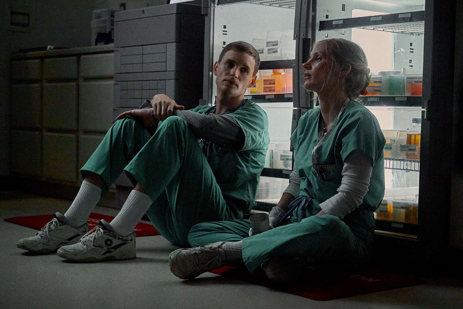 The Good Nurse (2022). L to R: Eddie Redmayne as Charlie Cullen and Jessica Chastain as Amy Loughren.