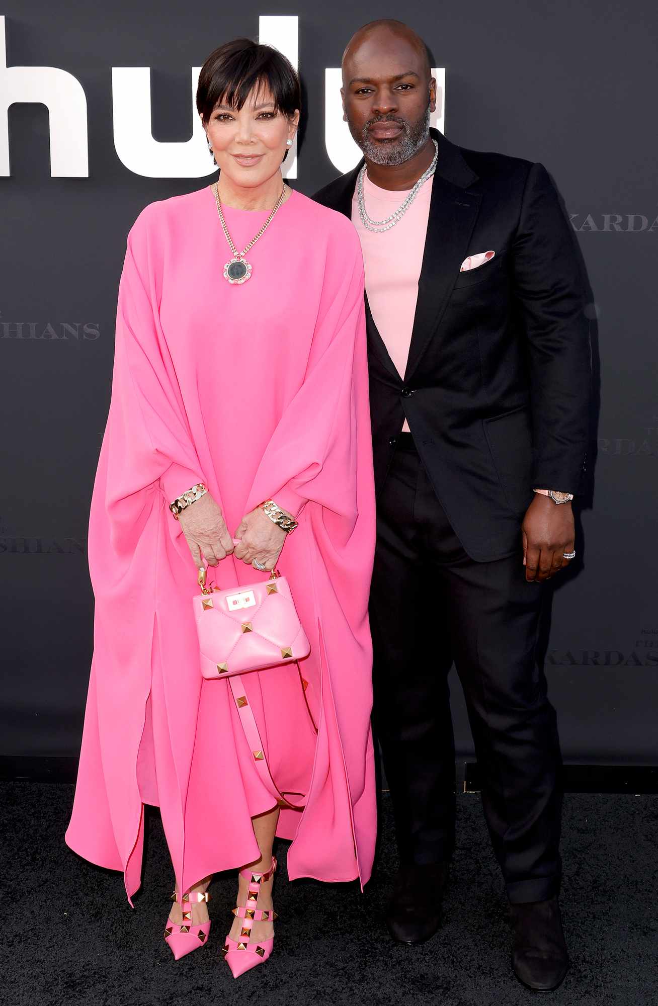 Kris Jenner and Corey Gamble attend the Los Angeles premiere of Hulu's new show "The Kardashians" at Goya Studios on April 07, 2022 in Los Angeles, California