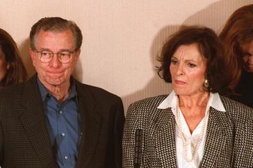 Lou Brown fights his emotion with wife Juditha Brown at his side a he speak at a post verdict press conference following the final verdict in the Simpson Civil Trial