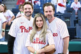 PHILADELPHIA, PENNSYLVANIA - SEPTEMBER 27: (L-R) Actors Will Friedle, Danielle Fishel and Rider Strong pose for a photo during a game between the Philadelphia Phillies and the Pittsburgh Pirates at Citizens Bank Park