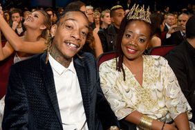 Recording artist Wiz Khalifa (L) and Peachie Wimbush attend the 2015 American Music Awards at Microsoft Theater on November 22, 2015 in Los Angeles, California.