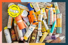 An assortment of sunscreens in a pile 