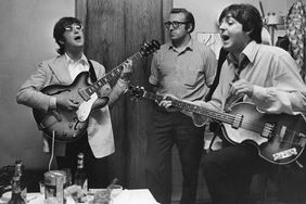  John Lennon, Mal Evans, and Paul McCartney backstage at Munichâs Circus-Krone-Bau 