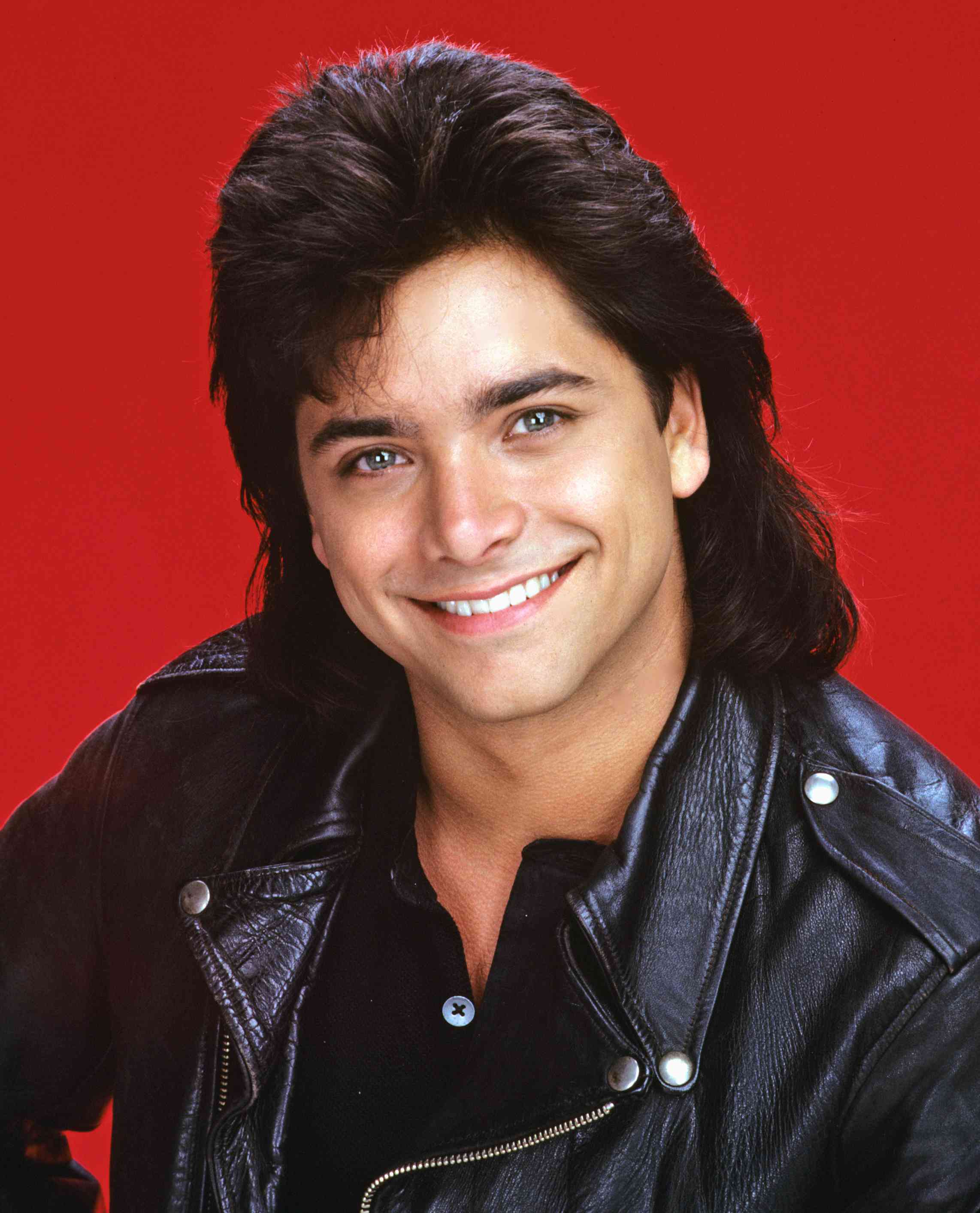 FULL HOUSE: John Stamos played Jesse Cochran (later changed to Katsopolis), who moved in with his widowed brother-in-law, Danny Tanner, to help raise nieces, D.J., Stephanie and Michelle