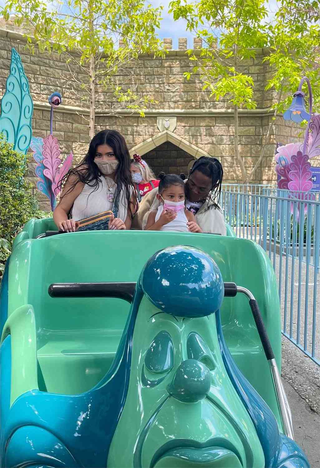 Kylie Jenner, Stormi, and Travis Scott at Disney