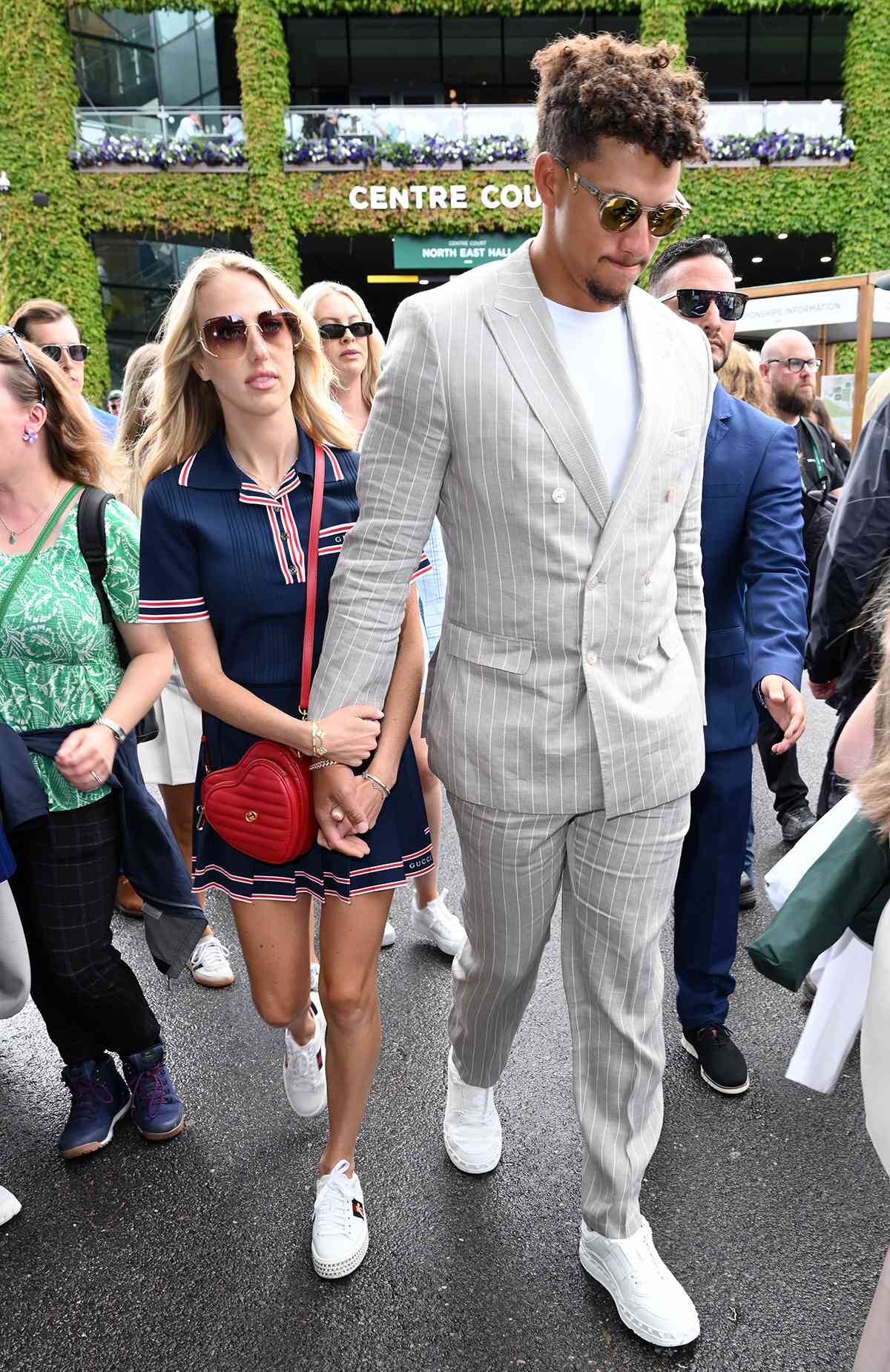 Brittany Mahomes and Patrick Mahomes attend day five of the Wimbledon Tennis Championships at the All England Lawn Tennis and Croquet Club on July 05, 2024 in London, England
