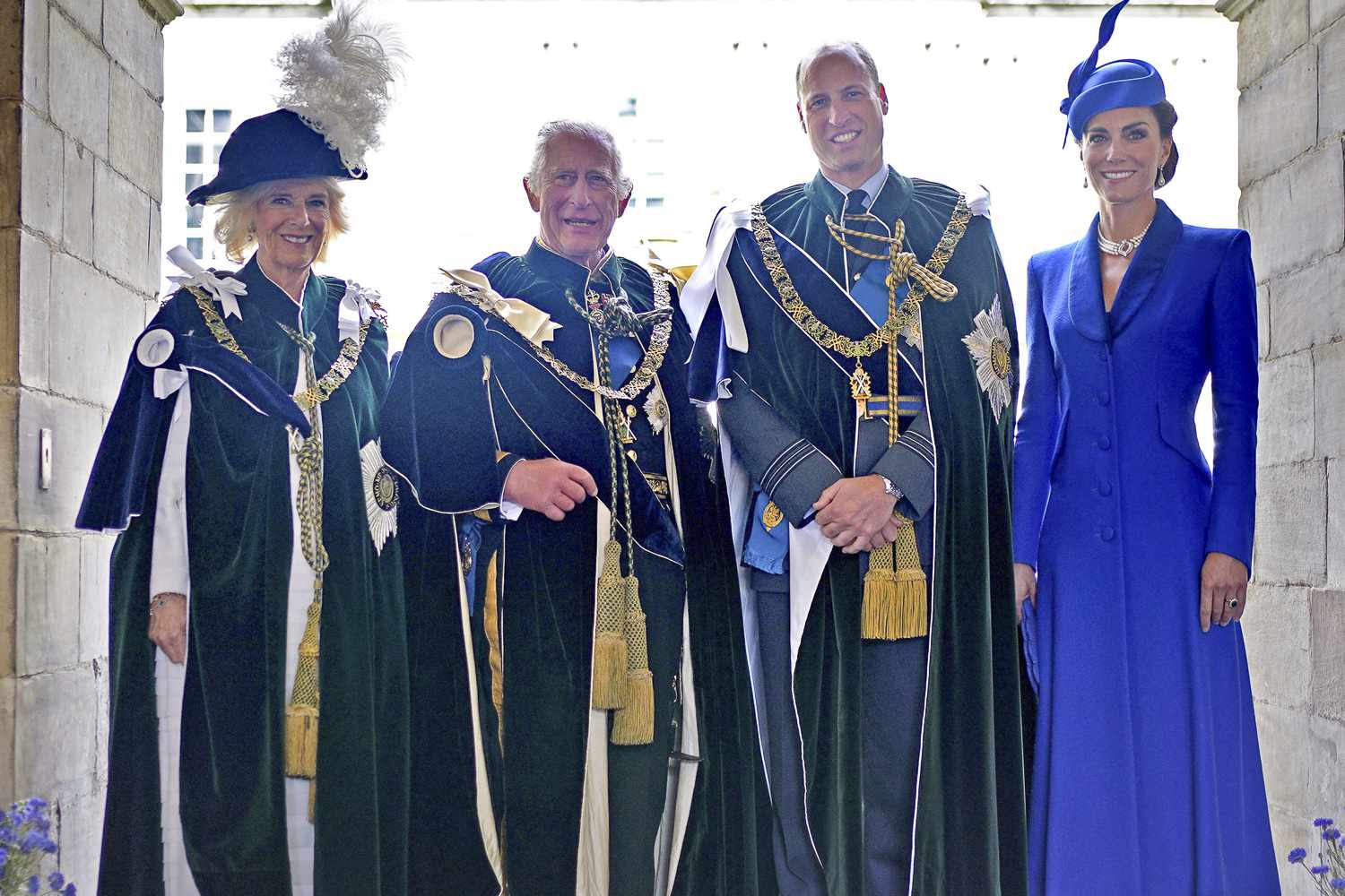 Britain's Queen Camilla, Britain's King Charles III, Britain's Prince William, Prince of Wales and Britain's Catherine, Princess of Wales pose for a photograph after watching a fly-past by the British Royal Air Force's (RAF) aerobatic team, the "Red Arrows", from the Palace of Holyroodhouse, in Edinburgh on July 5, 2023, following a National Service of Thanksgiving and Dedication. Scotland on Wednesday marked the Coronation of King Charles III and Queen Camilla during a National Service of Thanksgiving and Dedication where the The King was presented with the Honours of Scotland
