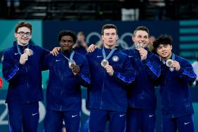 (L-R) Stephen Nedoroscik of United States, Frederick Richard of United States, Brody Malone of United States, Paul Juda of United States, Asher Hong of United States pose for a photo with their bronze medalduring the Men's Artistic Gymnastics Team Final on day three of the Olympic Games Paris 2024 at Bercy Arena on July 29, 2024 in Paris, France.