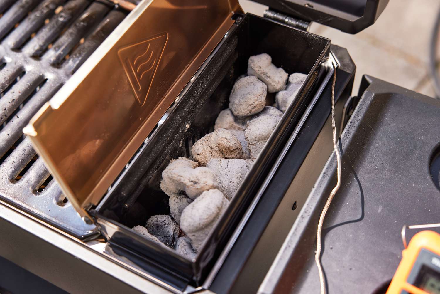 Coal is inside the Masterbuilt Portable Charcoal Grill and Smoker
