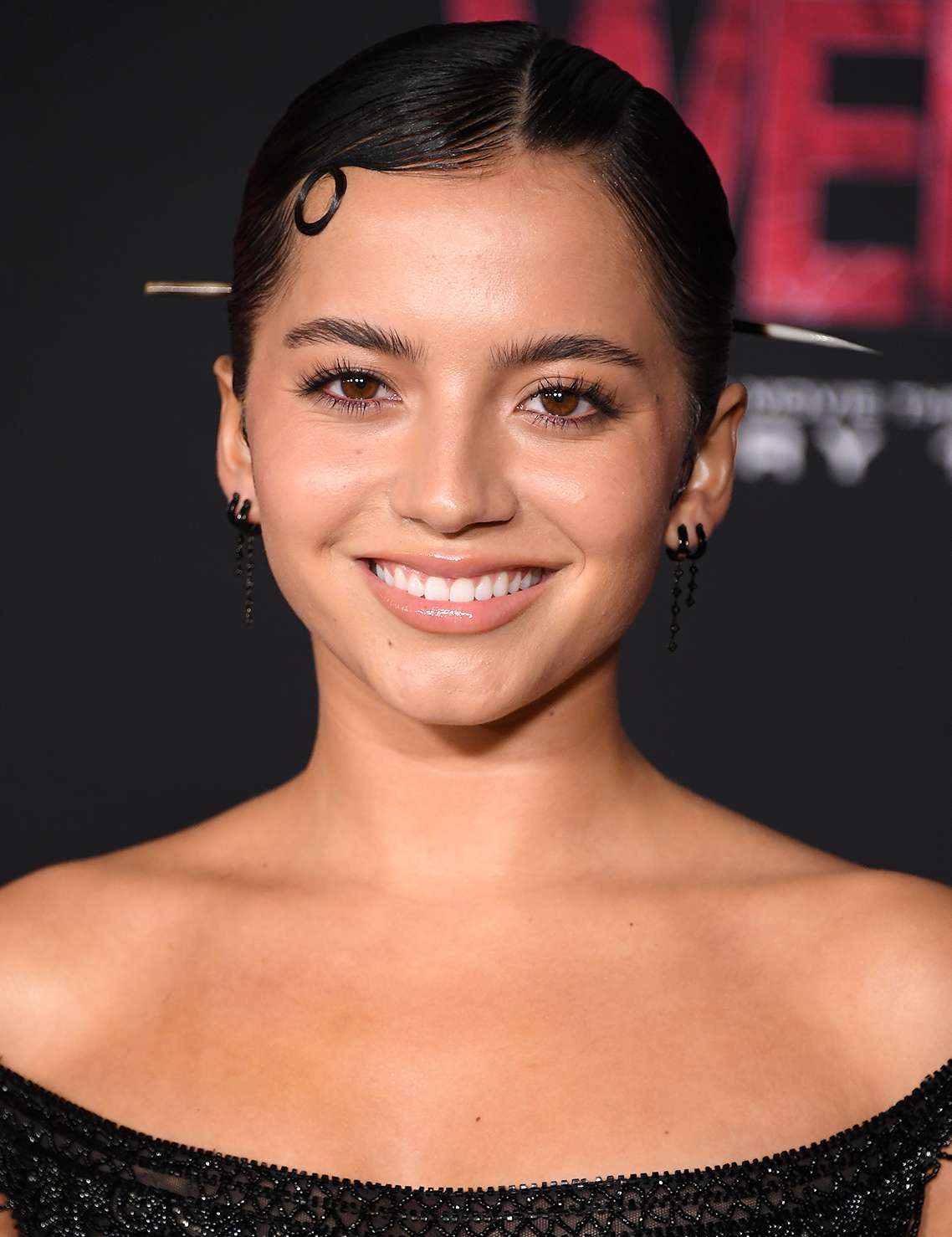 Isabela Merced arrives at the World Premiere Of Sony Pictures' "Madame Web" at Regency Village Theatre on February 12, 2024 in Los Angeles, California. 