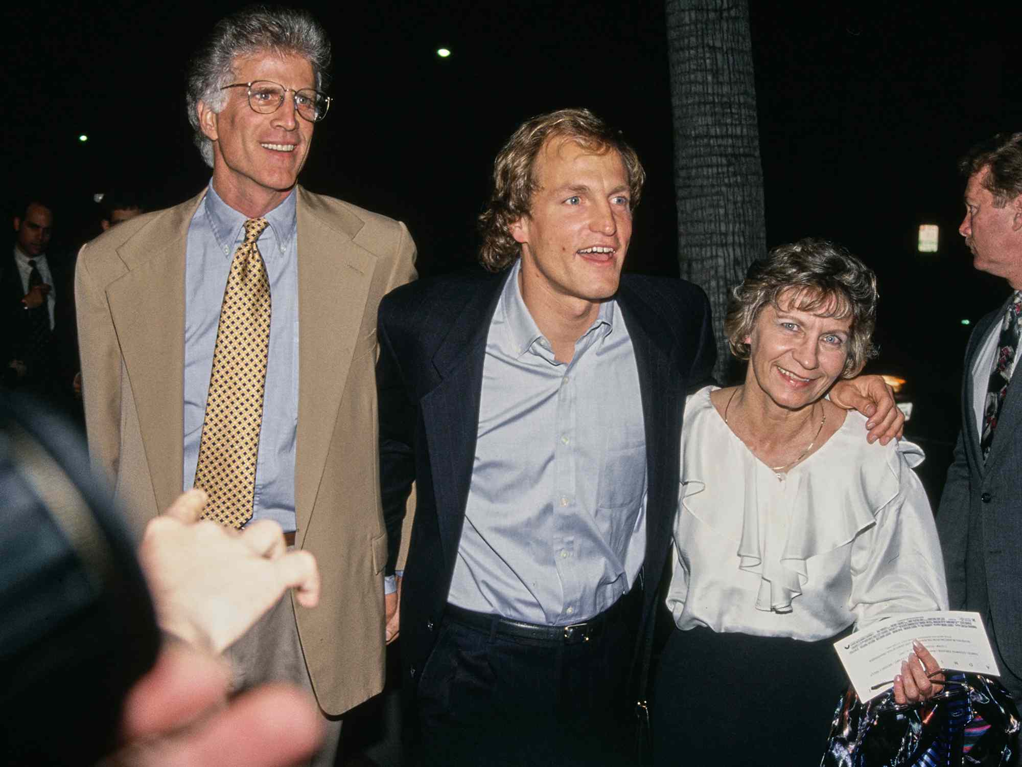 Ted Danson, Woody Harrelson, and Harrelson's mother, Diane attend a VIP screening of 'Indecent Proposal' on April 6, 1993.