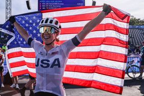 US Kristen Faulkner celebrates her victory after winning the women's cycling road race during the Paris 2024 Olympic Games in Paris, on August 4, 2024. 