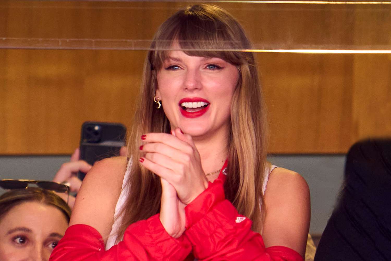 Taylor Swift cheers from a suite as the Kansas City Chiefs play the Chicago Bears at GEHA Field at Arrowhead Stadium on September 24, 2023 in Kansas City, Missouri