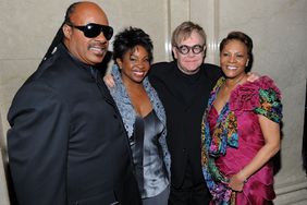 Stevie Wonder, Gladys Knight, Elton John and Dionne Warwick pose backstage the amfAR New York Gala to kick off Fall 2011 Fashion Week at Cipriani Wall Street on February 9, 2011 in New York City.