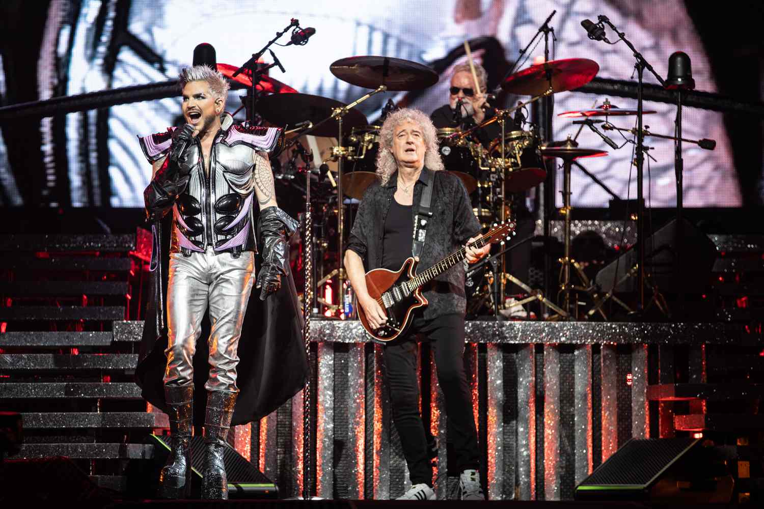 Adam Lambert performs with Brian May and Roger Taylor of Queen at Chase Center on November 08, 2023 in San Francisco, California.