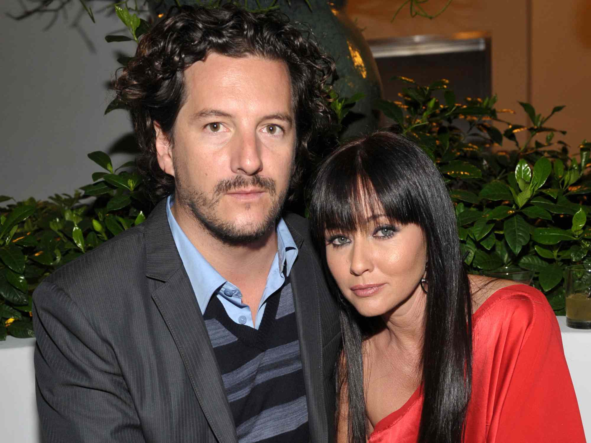 Kurt Iswarienko and Shannen Doherty attend the Entertainment Weekly and Women in Film pre-Emmy Party on September 17, 2009 in West Hollywood, California.