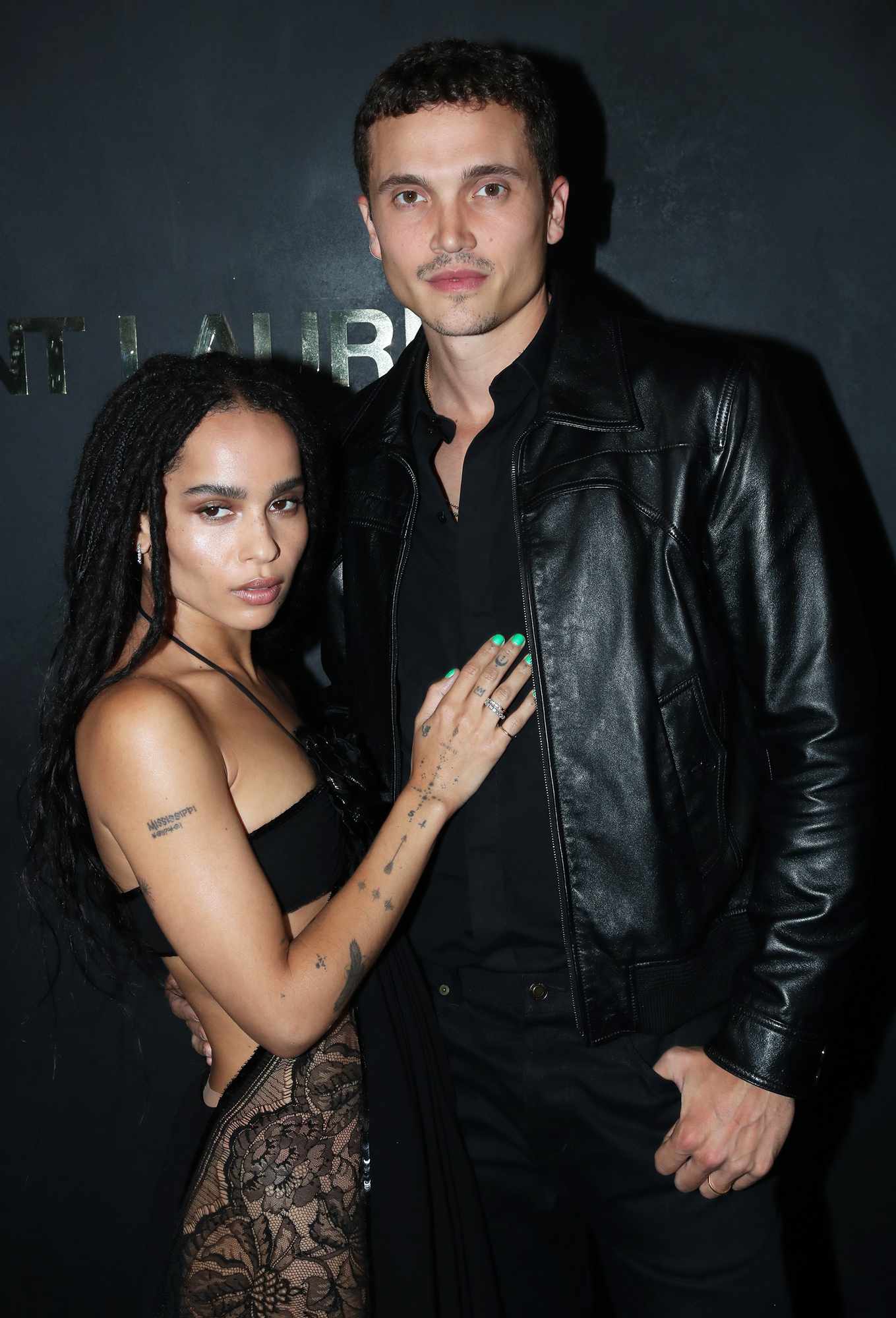 Zoe Kravitz and her companion actor Karl Glusman attend the Saint Laurent Womenswear Spring/Summer 2020 show as part of Paris Fashion Week on September 24, 2019 in Paris, France