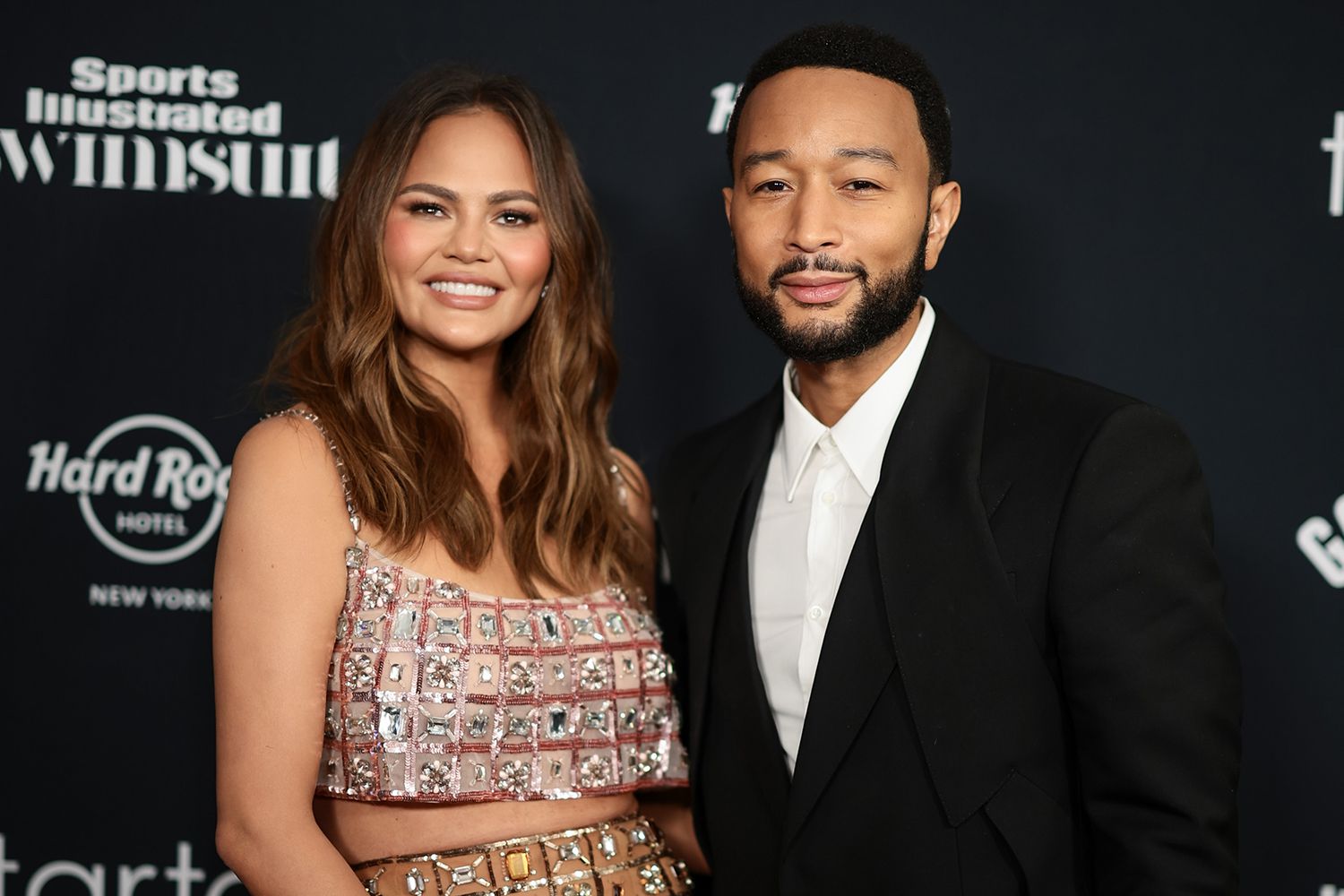 Chrissy Teigen and John Legend attend the Sports Illustrated Swimsuit 2024 Issue Release and 60th Anniversary Celebration 