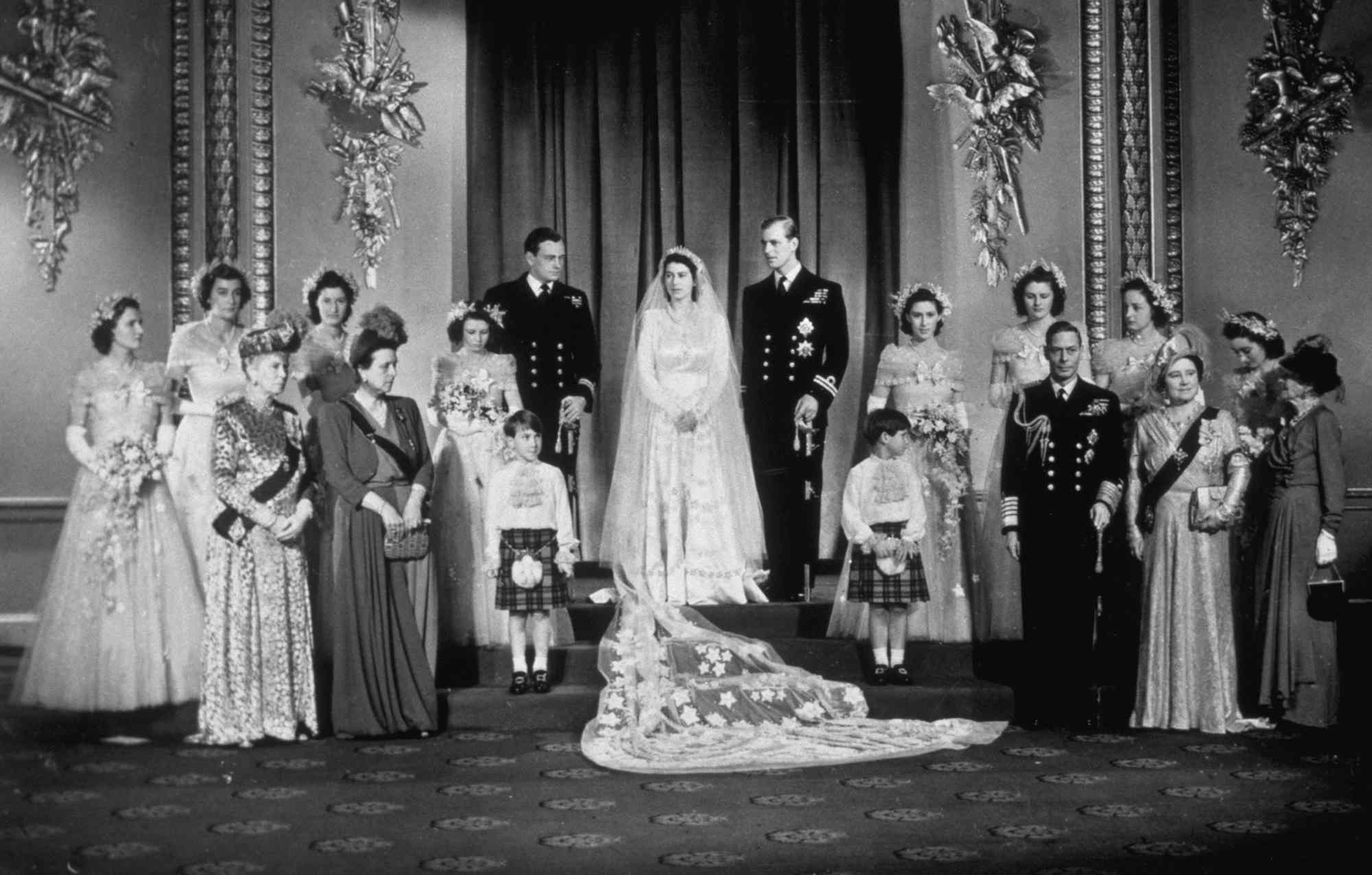 Princess Elizabeth, Prince Philip, Duke of Edinburgh with King George VI and Queen Elizabeth (right) and members of the immediate and extended Royal Family at Buckingham Palace after their wedding