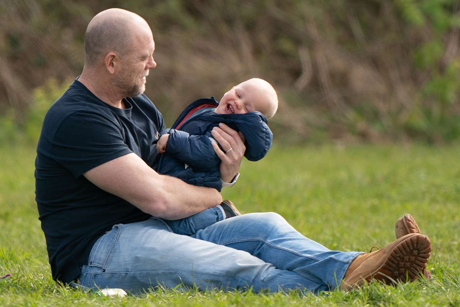 Mike Tindall with his son Lucas at the Barefoot Retreats Burnham Market International Horse Trials in Norfolk where Zara Tindall is competing. Picture date: Thursday April 14, 2022.