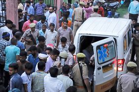 An injured arrives in an ambulance at the Sikandrarao hospital in Hathras district about 350 kilometers (217 miles) southwest of Lucknow, India, Tuesday, July 2, 2024. 