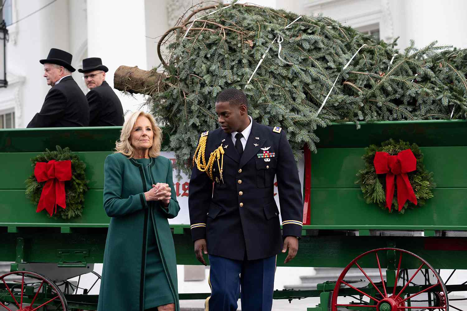 US First Lady Jill Biden receives the official 2023 White House Christmas Tree, an 18.5 foot Fraser Fir from Fleetwood, North Carolina, which will stand floor to ceiling in the Blue Room, on the North Lawn of the White House. in Washington, DC, on November 20, 2023