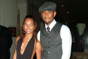 Rozanda "Chilli" Thomas with boyfriend Usher arriving at the Stella McCartney store opening party on 14th Street in New York City. September 20, 2002. 