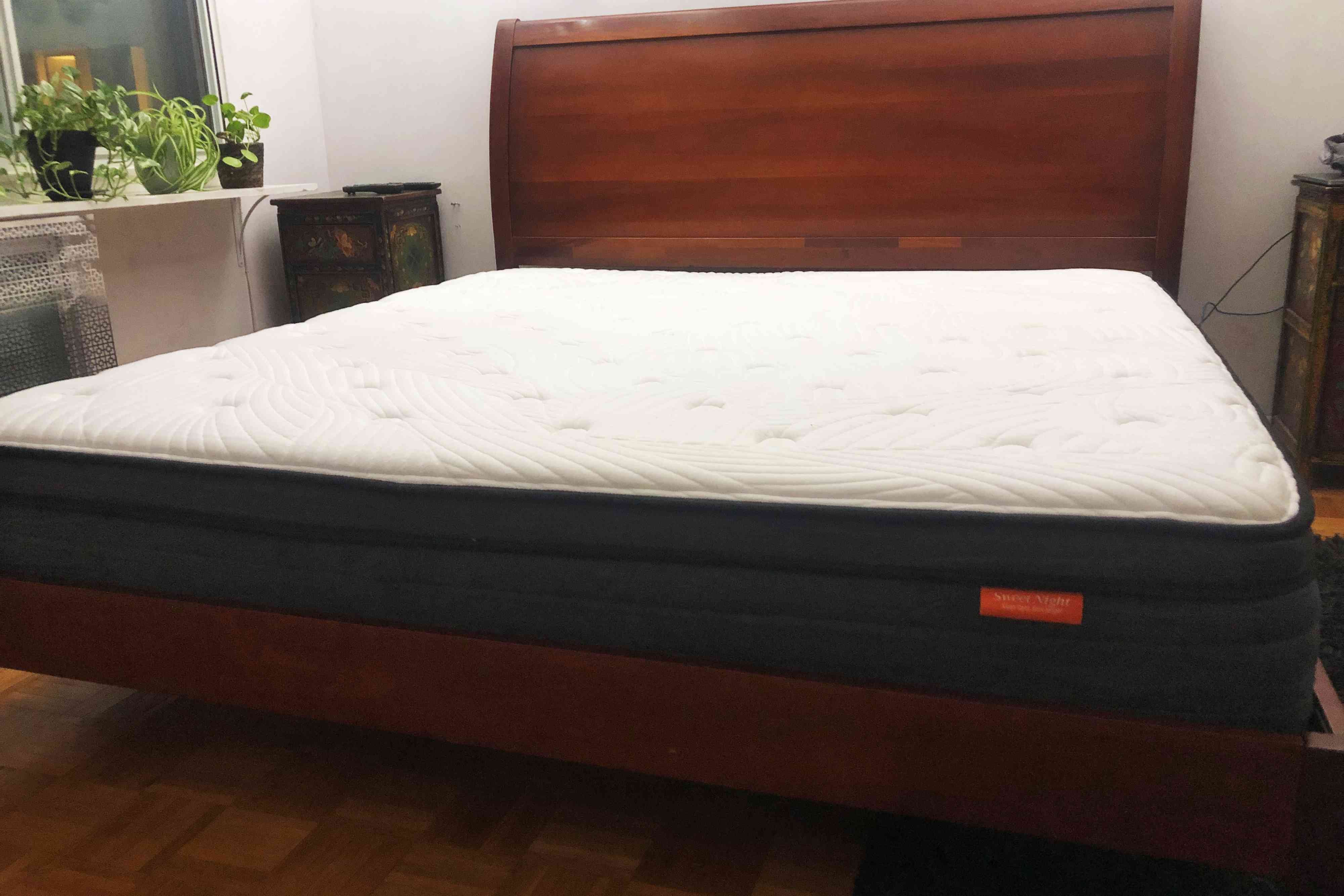 Sweetnight Hybrid Coil Mattress on wooden bed