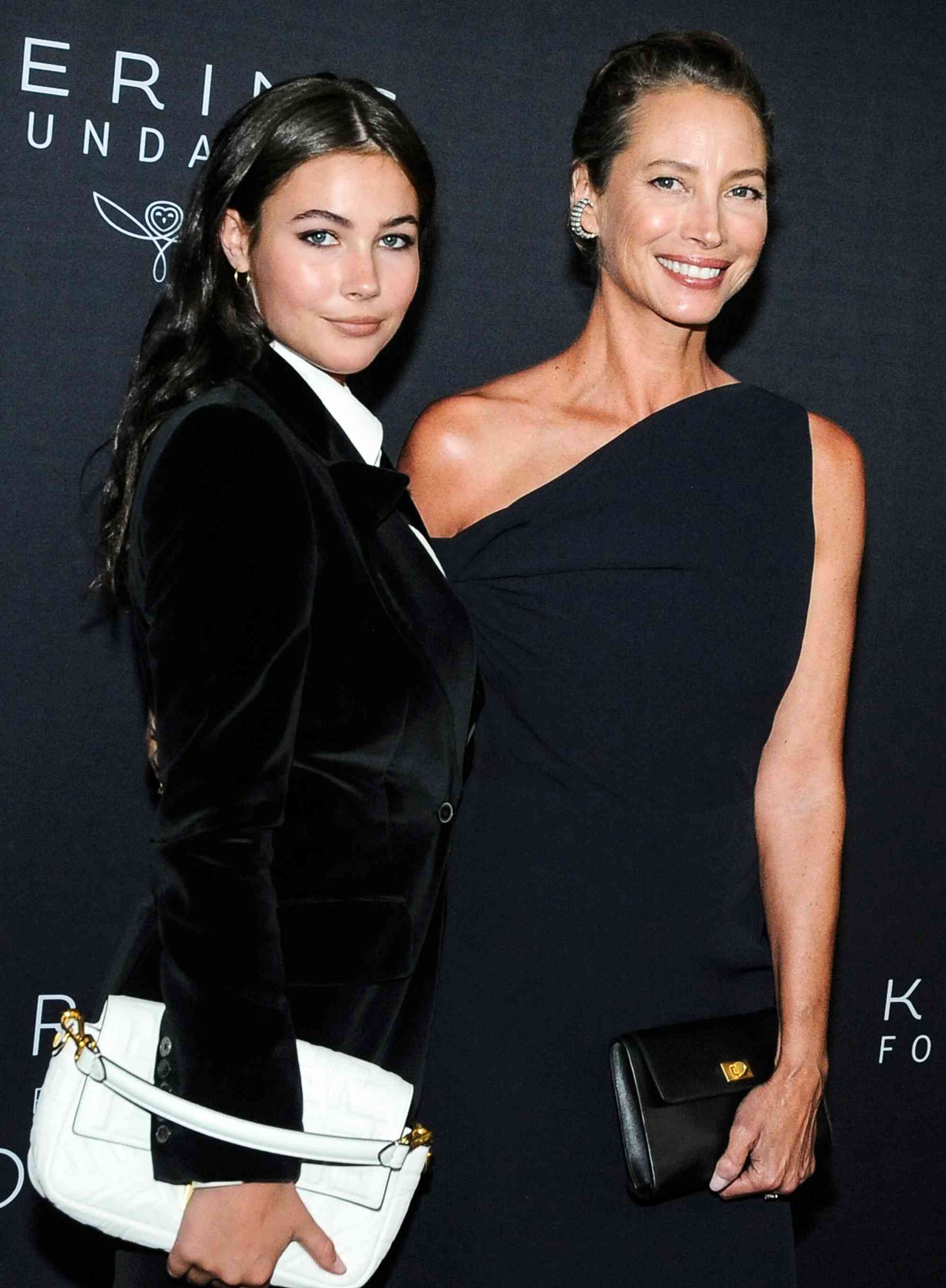 Grace Burns and Christy Turlington attend Kering's 2nd Annual Caring For Women Dinner at The Pool on September 12, 2023 in New York. 