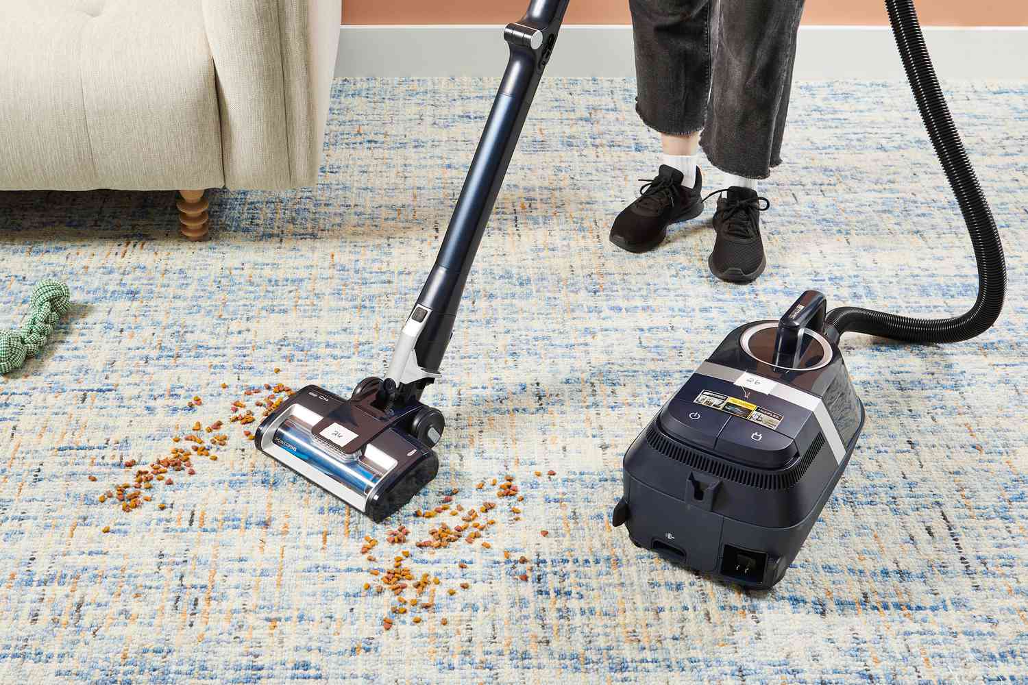 Shark Canister Pet Bagless Corded Vacuum used to clean spill on the carpet