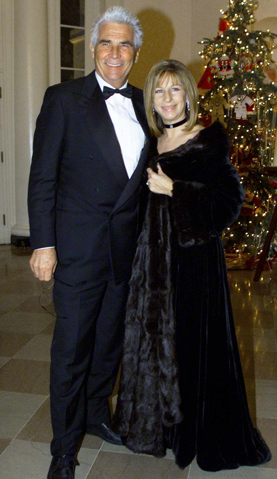 Barbra Streisand and her husband James Brolin arrive at the White House December 20, 2000 in Washington DC