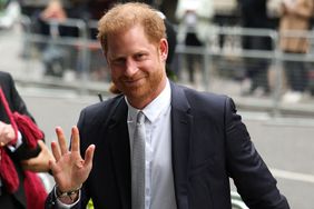 Prince Harry, Duke of Sussex, waves as he arrives to the Royal Courts of Justice, Britain's High Court, in central London