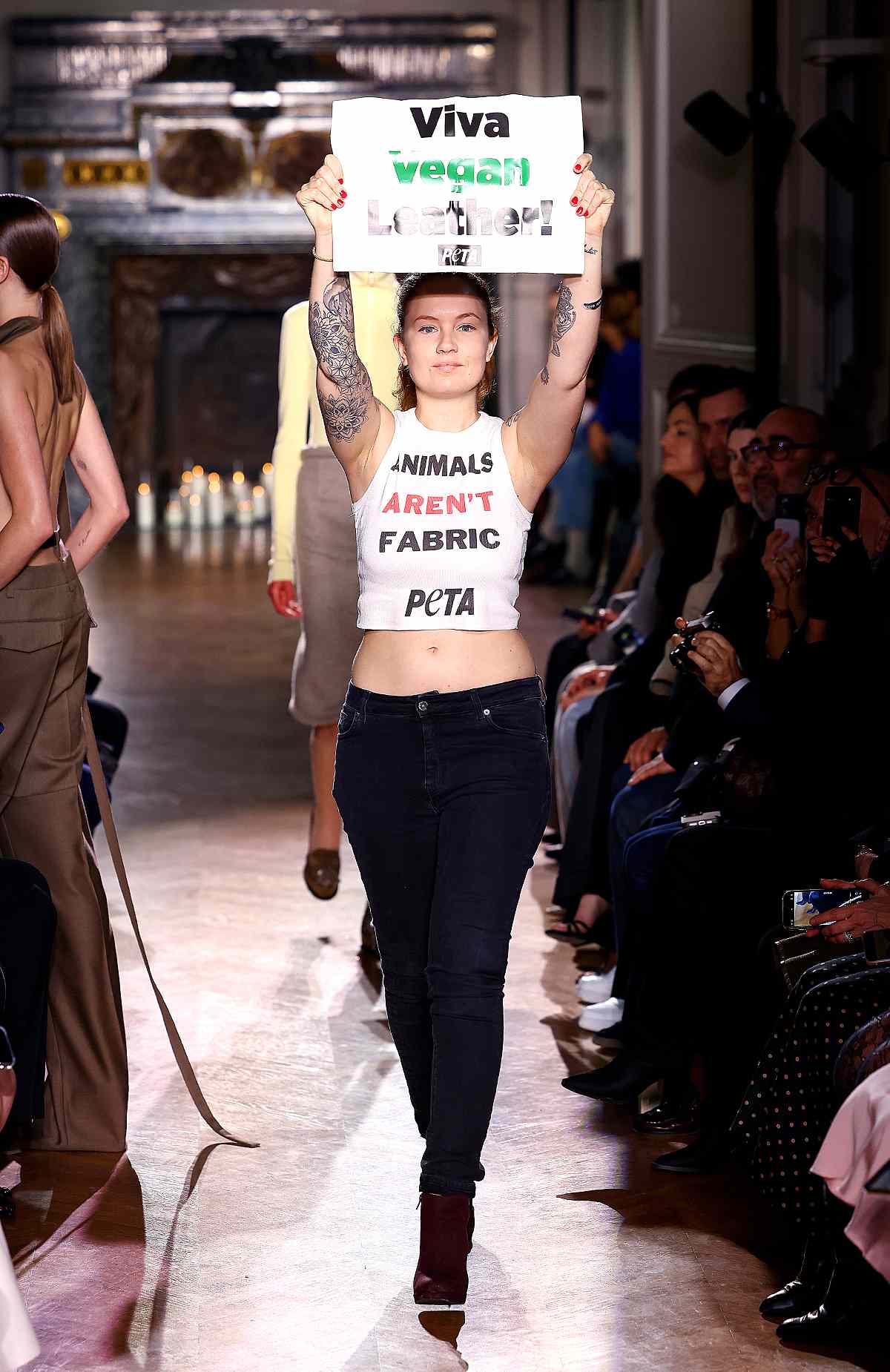 A Peta activist walks the runway during the Victoria Beckham Womenswear Fall/Winter 2024-2025 show as part of Paris Fashion Week on March 01, 2024 in Paris, France. 