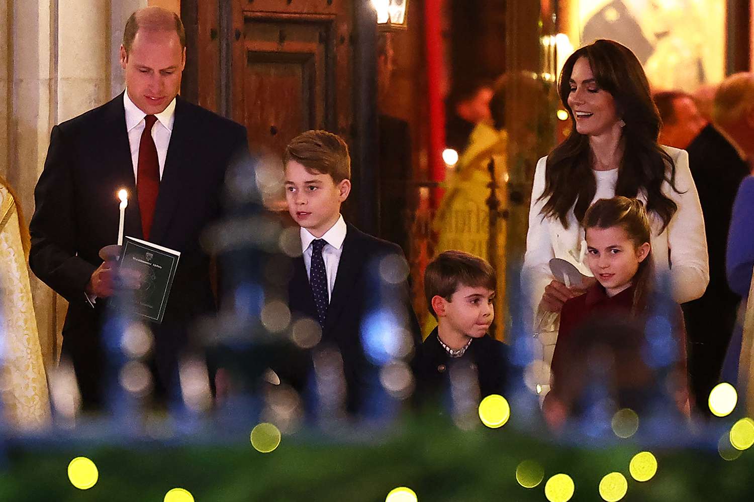 Britain's Prince William, Prince of Wales (L), Britain's Prince George of Wales (2L), Britain's Catherine, Princess of Wales (R), Britain's Prince Louis of Wales (C) and Britain's Princess Charlotte of Wales (2R) attend the "Together At Christmas" Carol Service" at Westminster Abbey in London on December 8, 2023. 