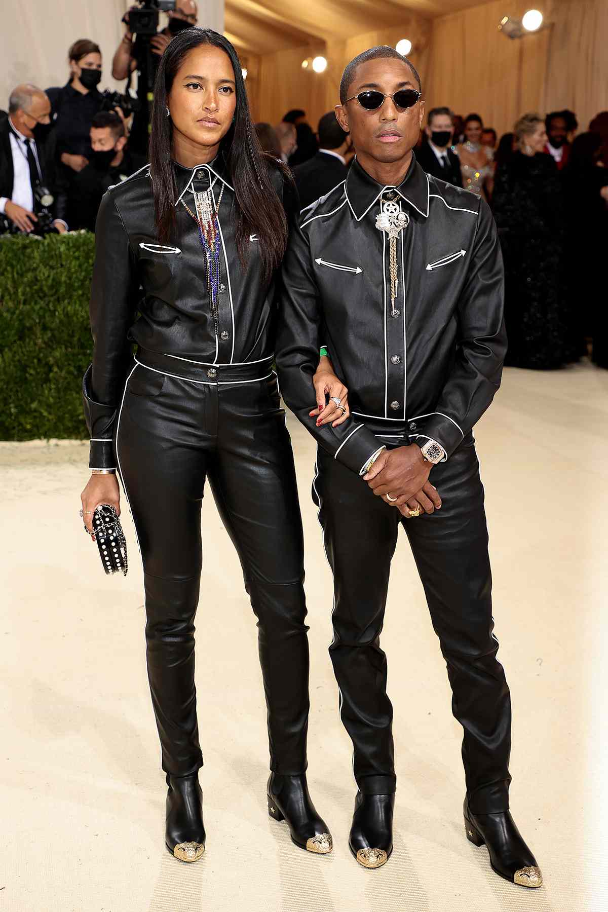 Helen Lasichanh and Pharrell Williams