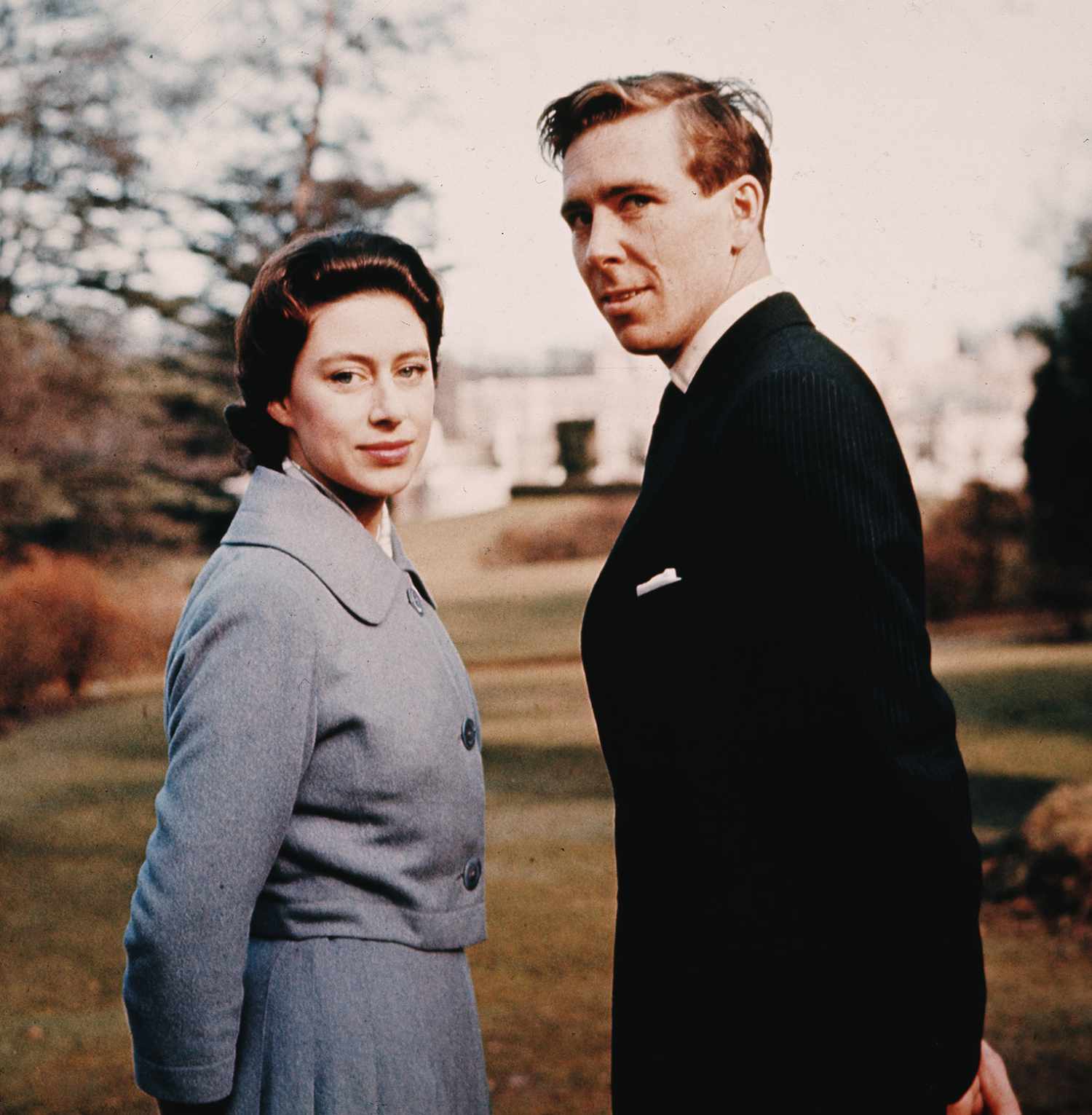 Princess Margaret (1930 - 2002) and Antony Armstrong-Jones in the grounds of Royal Lodge after they announced their engagement