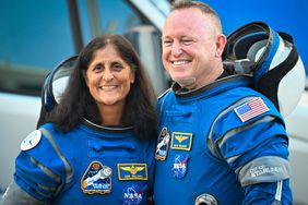 NASA astronauts Butch Wilmore (R) and Suni Williams, wearing Boeing spacesuits, depart the Neil A. Armstrong Operations and Checkout Building at Kennedy Space Center for Launch Complex 41 at Cape Canaveral Space Force Station in Florida to board the Boeing CST-100 Starliner spacecraft for the Crew Flight Test launch , on June 5, 2024. 