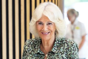 Queen Camilla smiles as she arrives for her visit to the new Dyson Cancer Centre at Royal United Hospitals Bath NHS Foundation Trust on September 03, 2024 in Bath, England.