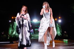 Florence Welch of Florence + The Machine and Taylor Swift perform onstage during "Taylor Swift | The Eras Tour" at Wembley Stadium