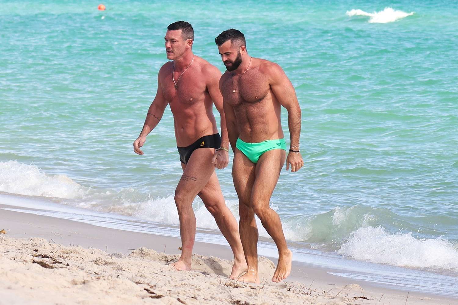 Luke Evans hits the beach with his hunky boyfriend Fran Tomas in Miami!