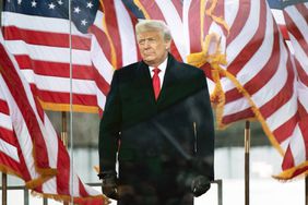 US President Donald Trump arrives to speak to supporters from The Ellipse near the White House on January 6, 2021, in Washington, DC. - Thousands of Trump supporters, fueled by his spurious claims of voter fraud, are flooding the nation's capital protesting the expected certification of Joe Biden's White House victory by the US Congress. 