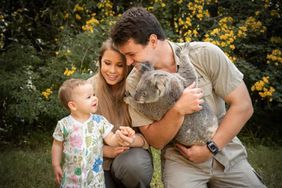 Bindi Irwin, Grace Warrior, and Chandler Powell with a koala