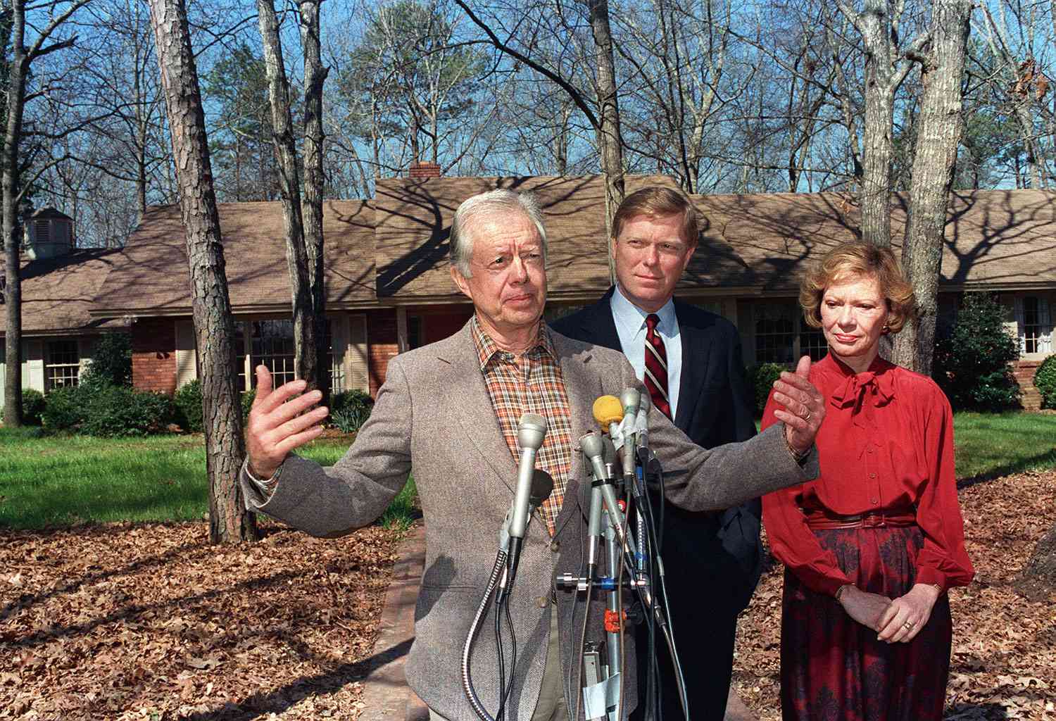 Former US President Jimmy Carter (L) addresses media 01 March 1988 outside Carter's residence in Plains while Democratic party presidential hopeful Richard Gephardt (C) and Rosalynn Carter look on. Carter did not endorse Gephard but said he would work to help the winner of the Democratic nomination. Carter, 78, on Friday 11 October 2002 won the 2002 Nobel Peace Prize for years of tireless effort as an international mediator. Carter, 78, was honoured for "his decades of untiring effort to fin peaceful solutions to international conflicts, to advance democracy and human rights, and to promote economic and social development", the Norwegian Nobel Committee said.